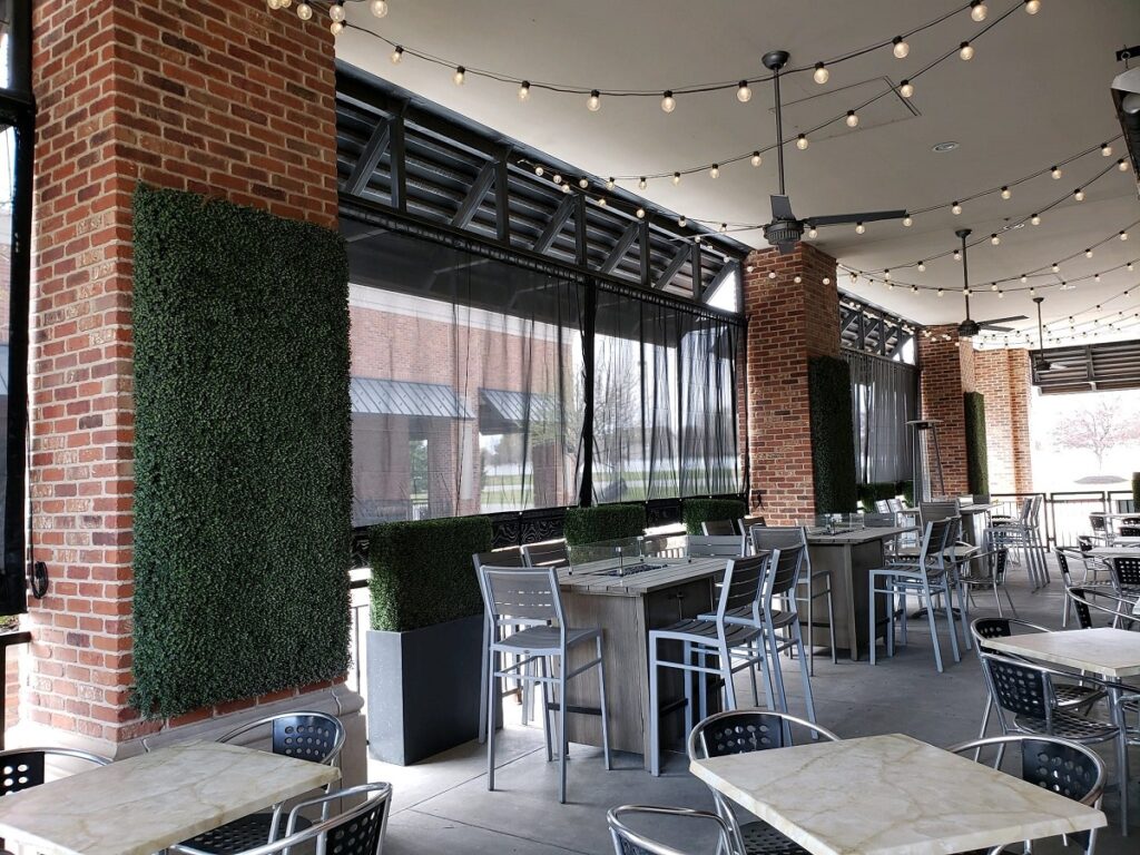 Commercial outdoor curtains and restaurant patio enclosures