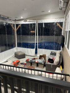White outdoor residential drop enclosure